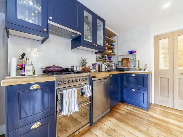 Navy shaker kitchen with range cooker fitted by NOVA