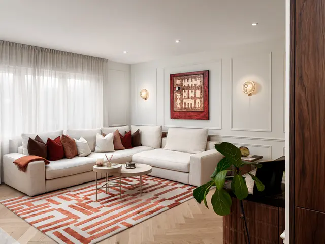 Fully renovated living room with panelled walls and herringbone floor